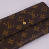 Louis Vuitton Sarah Wallet in Monogram Canvas