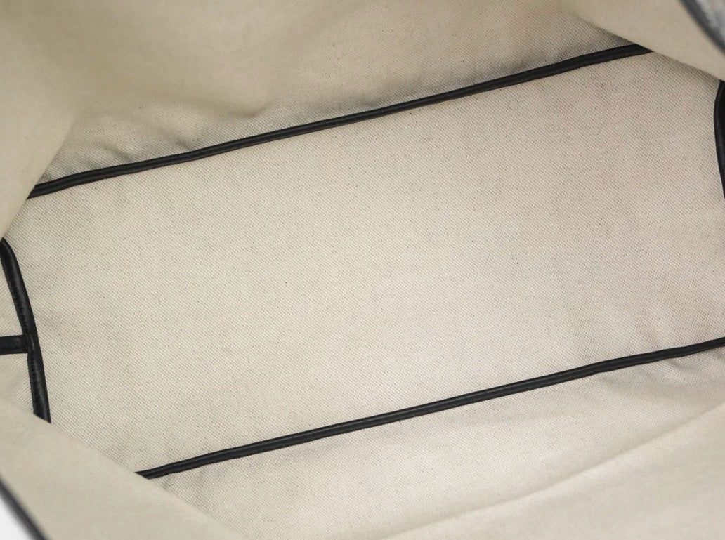 Interior view of a SLG Luxury Goyard Saint Louis tote bag showing the spacious beige canvas base and black trim.