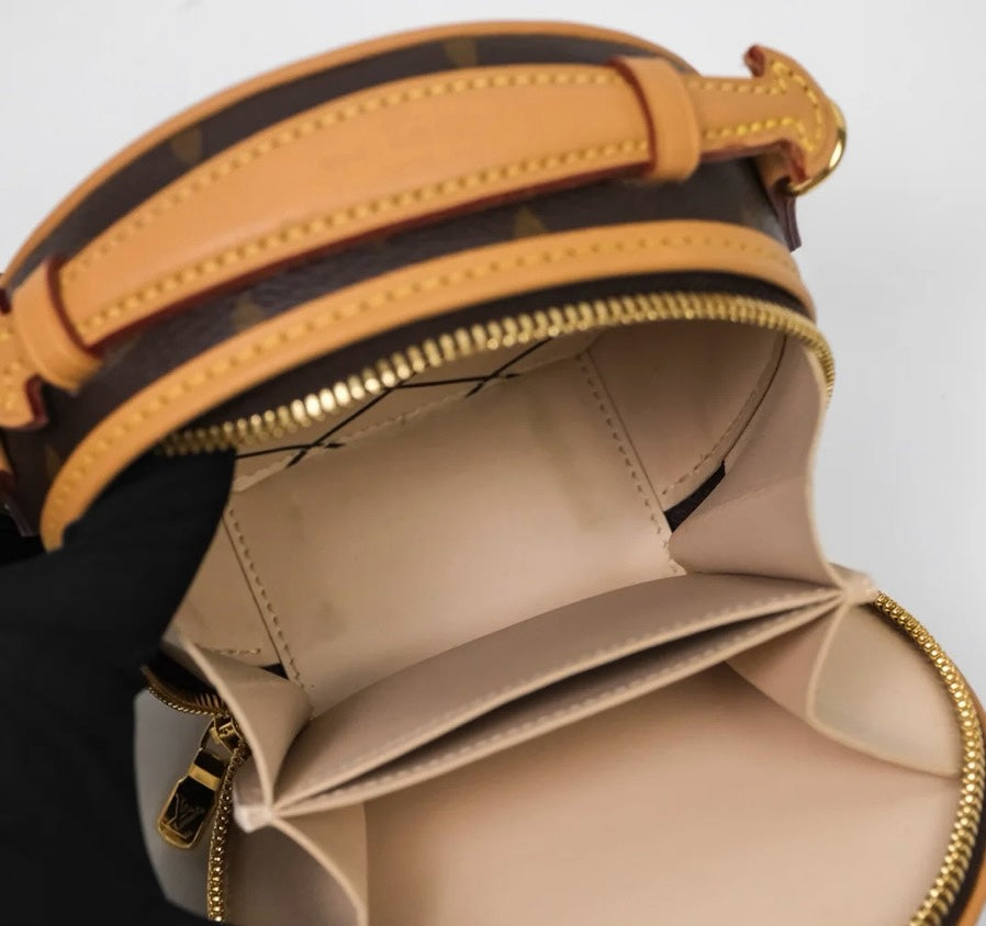 SLG Luxury Louis Vuitton Boîte Chapeau Souple Mini bag interior with light beige lining and gold zipper detail