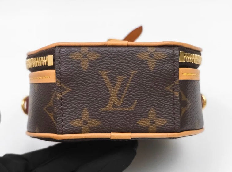 SLG Luxury Louis Vuitton Boîte Chapeau Souple Mini in brown monogram coated canvas with natural cowhide leather trim.